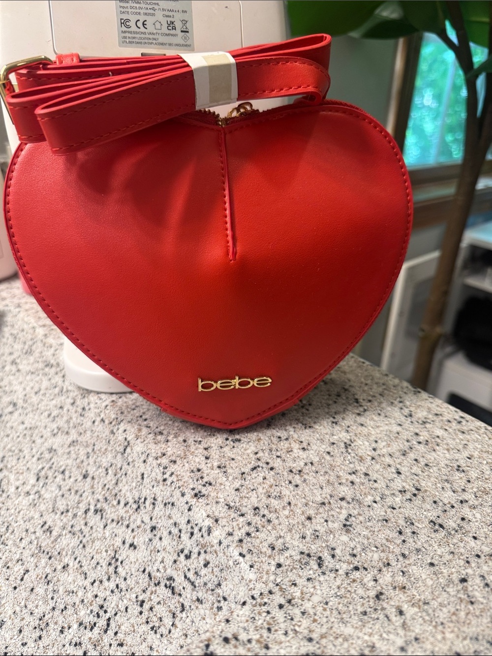 bebe Red Heart-Shaped Crossbody Bag with Gold Logo